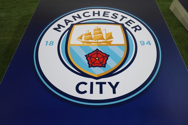 MANCHESTER, ENGLAND - NOVEMBER 07: The Manchester City badge on a board during the Group F match of the UEFA Champions League between Manchester City and FC Shakhtar Donetsk at Etihad Stadium on November 7, 2018 in Manchester, United Kingdom. (Photo by James Williamson - AMA/Getty Images)
