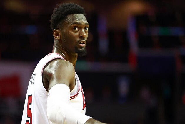 Chicago Bulls forward Bobby Portis signals after hitting a three-point basket against the Charlotte Hornets in the first half of an NBA basketball game Saturday, Feb. 2, 2019, in Charlotte, N.C. (AP Photo/Jason E. Miczek)
