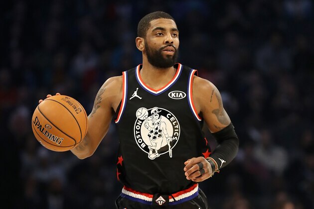 CHARLOTTE, NORTH CAROLINA - FEBRUARY 17:  Kyrie Irving #11 of the Boston Celtics and Team LeBron drives the ball against Team Giannis in the first quarter during the NBA All-Star game as part of the 2019 NBA All-Star Weekend at Spectrum Center on February 17, 2019 in Charlotte, North Carolina.  NOTE TO USER: User expressly acknowledges and agrees that, by downloading and/or using this photograph, user is consenting to the terms and conditions of the Getty Images License Agreement. Mandatory Copyright Notice: Copyright 2019 NBAE (Photo by Streeter Lecka/Getty Images)
