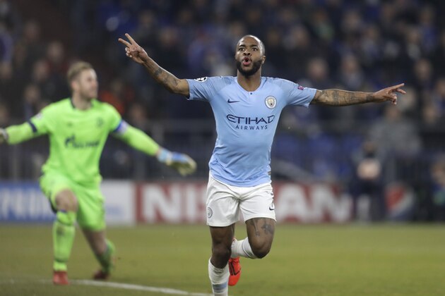 Manchester City forward Raheem Sterling, right, celebrates after passing Schalke goalkeeper Ralf Faehrmann to score his side's third goal during the first leg, round of sixteen, Champions League soccer match between Schalke 04 and Manchester City at Veltins Arena in Gelsenkirchen, Germany, Wednesday Feb. 20, 2019. (AP Photo/Michael Probst)