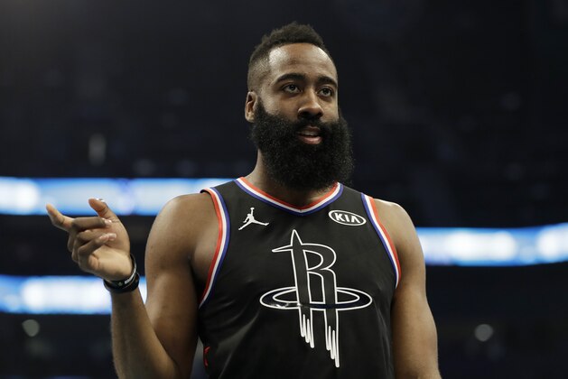 Team LeBron's James Harden, of the Houston Rockets, moves on the court against Team Giannis during the first half of an NBA All-Star basketball game, Sunday, Feb. 17, 2019, in Charlotte, N.C. (AP Photo/Chuck Burton)