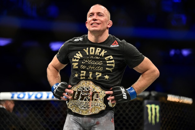 NEW YORK, NY - NOVEMBER 04:  Georges St-Pierre of Canada celebrates after defeating Michael Bisping of England in their UFC middleweight championship bout during the UFC 217 event inside Madison Square Garden on November 4, 2017 in New York City. (Photo by Jeff Bottari/Zuffa LLC/Zuffa LLC via Getty Images)
