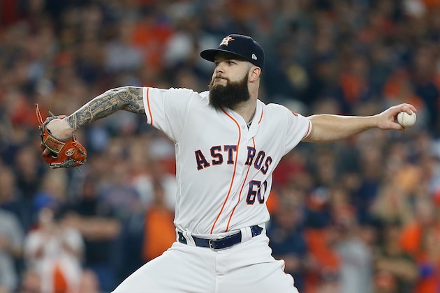 HOUSTON, TX - OCTOBER 16:  Dallas Keuchel #60 of the Houston Astros pitches in the first inning against the Boston Red Sox during Game Three of the American League Championship Series at Minute Maid Park on October 16, 2018 in Houston, Texas.  (Photo by Bob Levey/Getty Images)