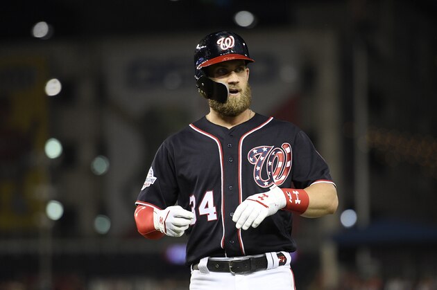 Washington Nationals' Bryce Harper stands on the field during a baseball game against the New York Mets, Friday, Sept. 21, 2018, in Washington. The Mets won 4-2. (AP Photo/Nick Wass)