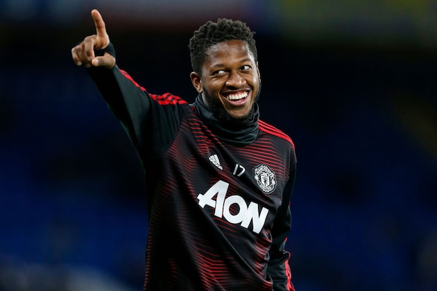Manchester United's Brazilian midfielder Fred warms up ahead of the English FA Cup fifth round football match between Chelsea and Manchester United at Stamford Bridge in London on February 18, 2019. (Photo by Ian KINGTON / AFP) / RESTRICTED TO EDITORIAL USE. No use with unauthorized audio, video, data, fixture lists, club/league logos or 'live' services. Online in-match use limited to 120 images. An additional 40 images may be used in extra time. No video emulation. Social media in-match use limited to 120 images. An additional 40 images may be used in extra time. No use in betting publications, games or single club/league/player publications. /         (Photo credit should read IAN KINGTON/AFP/Getty Images)