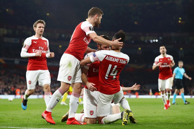 LONDON, ENGLAND - FEBRUARY 21: Sokratis Papastathopoulos of Arsenal celebrates with teammates after scoring his team's third goal during the UEFA Europa League Round of 32 Second Leg match between Arsenal and BATE Borisov at Emirates Stadium on February 21, 2019 in London, United Kingdom. (Photo by Clive Rose/Getty Images)