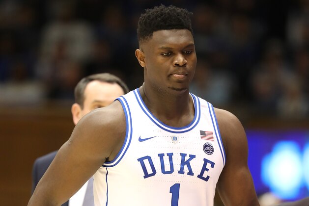 DURHAM, NORTH CAROLINA - FEBRUARY 20: Zion Williamson #1 of the Duke Blue Devils falls as his shoe breaks against Luke Maye #32 of the North Carolina Tar Heels during their game at Cameron Indoor Stadium on February 20, 2019 in Durham, North Carolina. (Photo by Streeter Lecka/Getty Images)
