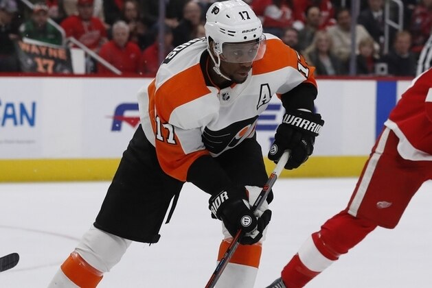 Philadelphia Flyers right wing Wayne Simmonds controls the puck during the second period of an NHL hockey game against the Detroit Red Wings, Sunday, Feb. 17, 2019, in Detroit. (AP Photo/Carlos Osorio)