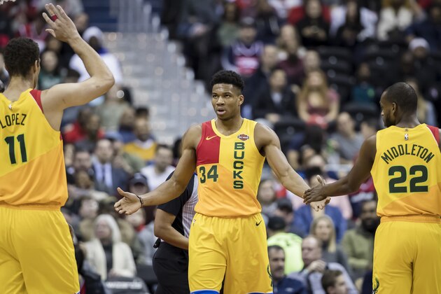 WASHINGTON, DC - FEBRUARY 2: Giannis Antetokounmpo #34 of the Milwaukee Bucks celebrates with teammates against the Washington Wizards during the first half at Capital One Arena on February 2, 2019 in Washington, DC. NOTE TO USER: User expressly acknowledges and agrees that, by downloading and or using this photograph, User is consenting to the terms and conditions of the Getty Images License Agreement. (Photo by Scott Taetsch/Getty Images)