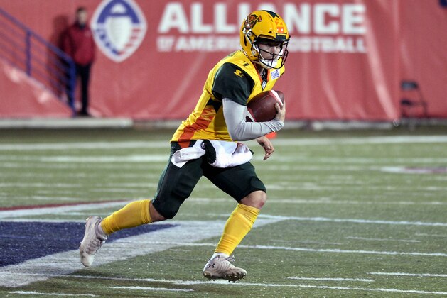 Arizona Hotshots quarterback John Wolford (7) carries the ball in the second half of an AAF football game against the Memphis Express Saturday, Feb. 16, 2019, in Memphis, Tenn. (AP Photo/Brandon Dill)