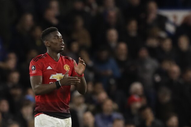 Manchester United's Paul Pogba celebrates after scoring his side's second goal during the English FA Cup fifth round soccer match between Chelsea and Manchester United at Stamford Bridge stadium in London, Monday, Feb. 18, 2019. (AP Photo/Matt Dunham)