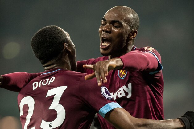 LONDON, ENGLAND - FEBRUARY 22: Issa Diop of West Ham United celebrate with Angelo Ogbonna of West Ham United after score 1st goal during the Premier League match between West Ham United and Fulham FC at London Stadium on February 22, 2019 in London, United Kingdom. (Photo by Sebastian Frej/MB Media/Getty Images)