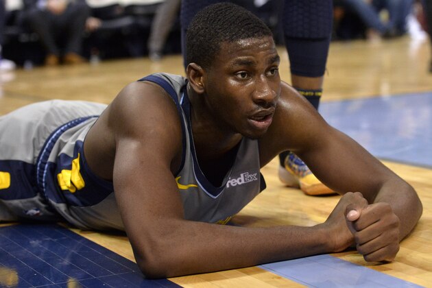 Memphis Grizzlies forward Jaren Jackson Jr. lies on the court in the second half of an NBA basketball game against the New Orleans Pelicans Saturday, Feb. 9, 2019, in Memphis, Tenn. (AP Photo/Brandon Dill)