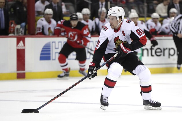 Ottawa Senators right wing Mark Stone in action against the New Jersey Devils during the first period of an NHL hockey game, Friday, Dec. 21, 2018, in Newark, N.J. (AP Photo/Julio Cortez)