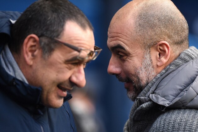 Manchester City's Spanish manager Pep Guardiola greets Chelsea's Italian head coach Maurizio Sarri ahead of the English Premier League football match between Manchester City and Chelsea at the Etihad Stadium in Manchester, north west England, on February 10, 2019. (Photo by Oli SCARFF / AFP) / RESTRICTED TO EDITORIAL USE. No use with unauthorized audio, video, data, fixture lists, club/league logos or 'live' services. Online in-match use limited to 120 images. An additional 40 images may be used in extra time. No video emulation. Social media in-match use limited to 120 images. An additional 40 images may be used in extra time. No use in betting publications, games or single club/league/player publications. /         (Photo credit should read OLI SCARFF/AFP/Getty Images)