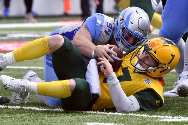 SALT LAKE CITY, UT - FEBRUARY 23: John Wolford #7 of Arizona Hotshots is sacked by Karter Schult #94 of Salt Lake Stallions during their Alliance of American Football game at Rice Eccles Stadium on February 23, 2019 in Salt Lake City, Utah. (Photo by Gene Sweeney Jr./AAF/Getty Images)