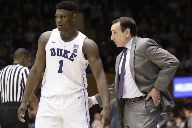 Duke's Zion Williamson speaks with coach Mike Krzyzewski during the second half of an NCAA college basketball game against Princeton in Durham, N.C., Tuesday, Dec. 18, 2018. (AP Photo/Gerry Broome)