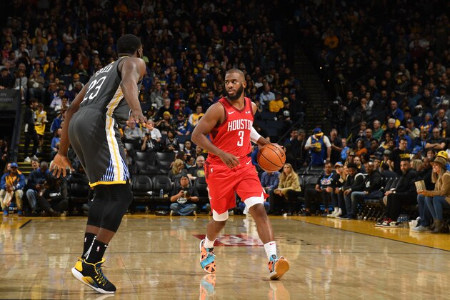 OAKLAND, CA - FEBRUARY 23: Chris Paul #3 of the Houston Rockets handles the ball against the Golden State Warriors on February 23, 2019 at ORACLE Arena in Oakland, California. NOTE TO USER: User expressly acknowledges and agrees that, by downloading and or using this photograph, User is consenting to the terms and conditions of the Getty Images License Agreement. Mandatory Copyright Notice: Copyright 2019 NBAE (Photo by Noah Graham/NBAE via Getty Images)