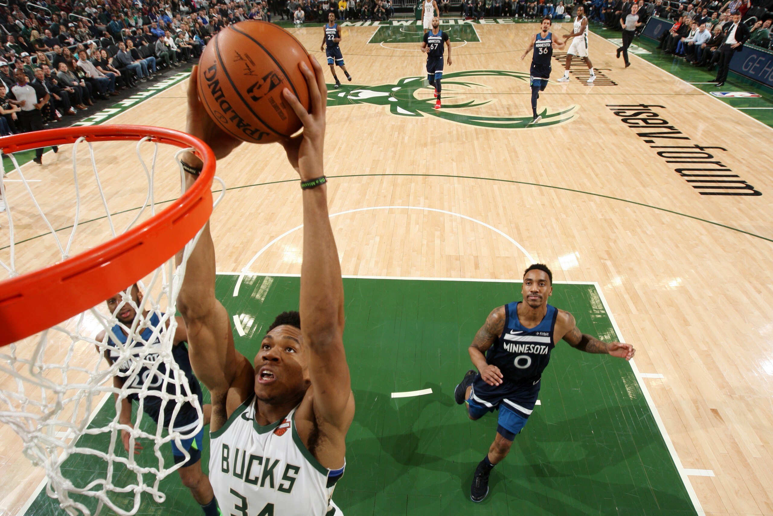 MILWAUKEE, WI - FEBRUARY 23:  Giannis Antetokounmpo #34 of the Milwaukee Bucks dunks the ball against the Minnesota Timberwolves on February 23, 2019 at the Fiserv Forum Center in Milwaukee, Wisconsin. NOTE TO USER: User expressly acknowledges and agrees that, by downloading and or using this Photograph, user is consenting to the terms and conditions of the Getty Images License Agreement. Mandatory Copyright Notice: Copyright 2019 NBAE (Photo by Gary Dineen/NBAE via Getty Images).