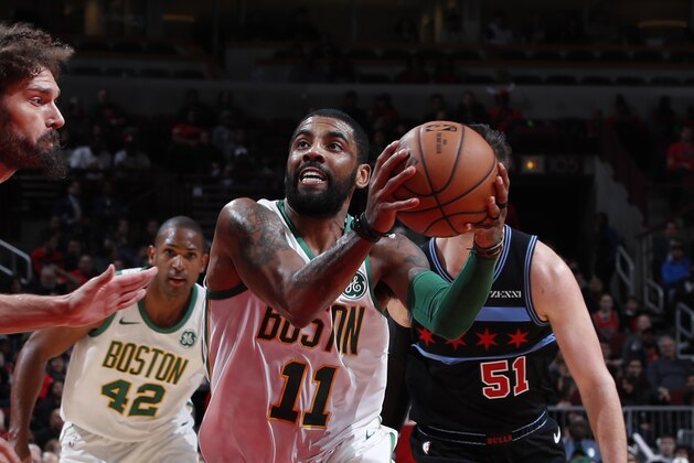 CHICAGO, IL - FEBRUARY 23: Kyrie Irving #11 of the Boston Celtics drives to the basket against the Chicago Bulls on February 23, 2019 at United Center in Chicago, Illinois. NOTE TO USER: User expressly acknowledges and agrees that, by downloading and or using this photograph, User is consenting to the terms and conditions of the Getty Images License Agreement. Mandatory Copyright Notice: Copyright 2019 NBAE (Photo by Jeff Haynes/NBAE via Getty Images)