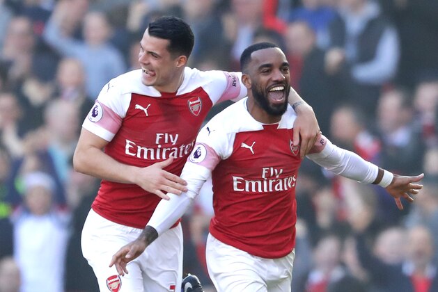 LONDON, ENGLAND - FEBRUARY 24:  Alexandre Lacazette of Arsenal celebrates after scoring his team's first goal during the Premier League match between Arsenal FC and Southampton FC at Emirates Stadium on February 23, 2019 in London, United Kingdom.  (Photo by Richard Heathcote/Getty Images)