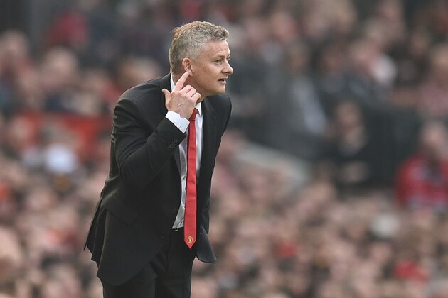 Manchester United's  Norwegian caretaker manager Ole Gunnar Solskjaer gestures from the touchline during the English Premier League football match between Manchester United and Liverpool at Old Trafford in Manchester, north west England, on February 24, 2019. (Photo by Oli SCARFF / AFP) / RESTRICTED TO EDITORIAL USE. No use with unauthorized audio, video, data, fixture lists, club/league logos or 'live' services. Online in-match use limited to 120 images. An additional 40 images may be used in extra time. No video emulation. Social media in-match use limited to 120 images. An additional 40 images may be used in extra time. No use in betting publications, games or single club/league/player publications. /         (Photo credit should read OLI SCARFF/AFP/Getty Images)
