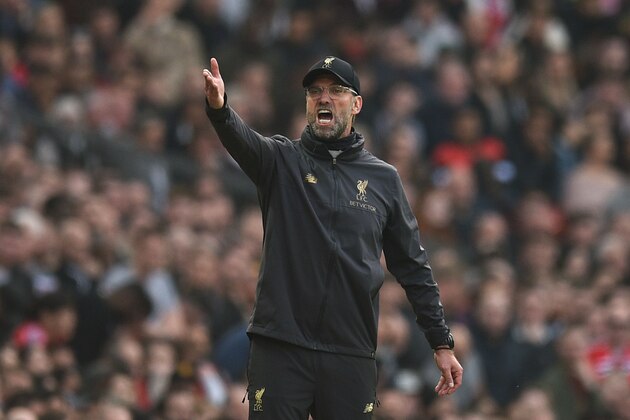 Liverpool's German manager Jurgen Klopp gestures from the touchline during the English Premier League football match between Manchester United and Liverpool at Old Trafford in Manchester, north west England, on February 24, 2019. (Photo by Oli SCARFF / AFP) / RESTRICTED TO EDITORIAL USE. No use with unauthorized audio, video, data, fixture lists, club/league logos or 'live' services. Online in-match use limited to 120 images. An additional 40 images may be used in extra time. No video emulation. Social media in-match use limited to 120 images. An additional 40 images may be used in extra time. No use in betting publications, games or single club/league/player publications. /         (Photo credit should read OLI SCARFF/AFP/Getty Images)