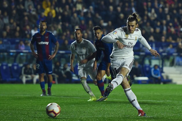 VALENCIA, SPAIN - FEBRUARY 24: Gareth Bale of Real Madrid CF scores his team's second goal from the penalty spot during the La Liga match between Levante UD and Real Madrid CF at Ciutat de Valencia on February 24, 2019 in Valencia, Spain. (Photo by Alex Caparros/Getty Images)