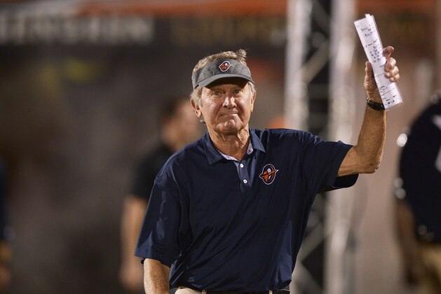 Orlando Apollos head coach Steve Spurrier waves to the crowd as he enters the field before kick-off against the Memphis Express during an AAF football game, Saturday, Feb. 23, 2019, at Spectrum Stadium in Orlando, Fla. (AP Photo/Rick Wilson)