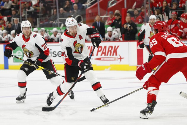 Ottawa Senators right wing Mark Stone (61) shoots against the Detroit Red Wings in the first period of an NHL hockey game Thursday, Feb. 14, 2019, in Detroit. (AP Photo/Paul Sancya)