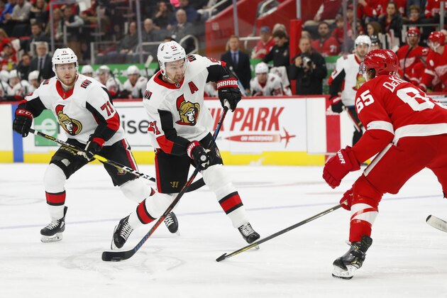 Ottawa Senators right wing Mark Stone (61) shoots against the Detroit Red Wings in the first period of an NHL hockey game Thursday, Feb. 14, 2019, in Detroit. (AP Photo/Paul Sancya)