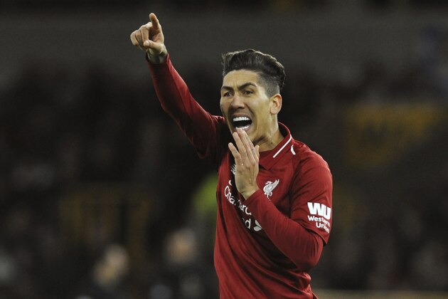 Liverpool's Roberto Firmino during the English FA Cup third round soccer match between Wolverhampton Wanderers and Liverpool at the Molineux Stadium in Wolverhampton, England, Monday, Jan. 7, 2019. (AP Photo/Rui Vieira)