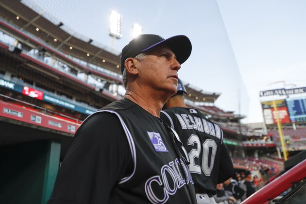 Colorado Rockies manager Bud Black watches from the dugout during the fourth inning of the team's baseball game against the Cincinnati Reds, Wednesday, June 6, 2018, in Cincinnati. (AP Photo/John Minchillo)