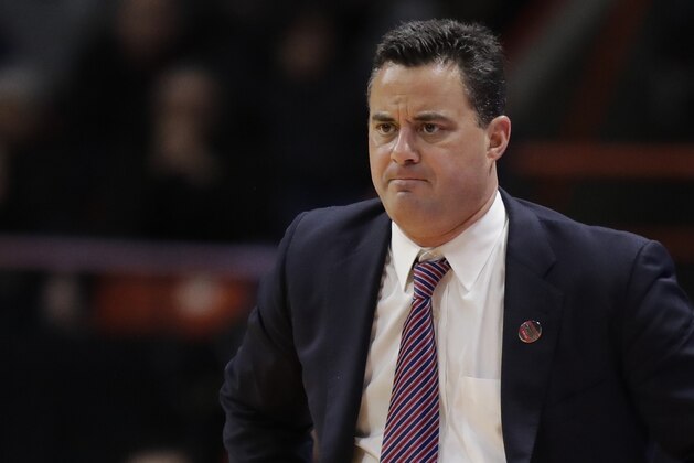 FILE - In this Thursday, March 15, 2018 file photo, Arizona head coach Sean Miller looks on during a first-round game against Buffalo in the NCAA men's college basketball tournament in Boise, Idaho. Arizona went through one of the program's most tumultuous seasons in 2017-18.  The Wildcats were ensnared in an FBI probe in recruiting before the season started, had a key player go down for a long stretch and were linked to the federal probe a second time late in the year. (AP Photo/Ted S. Warren, File)