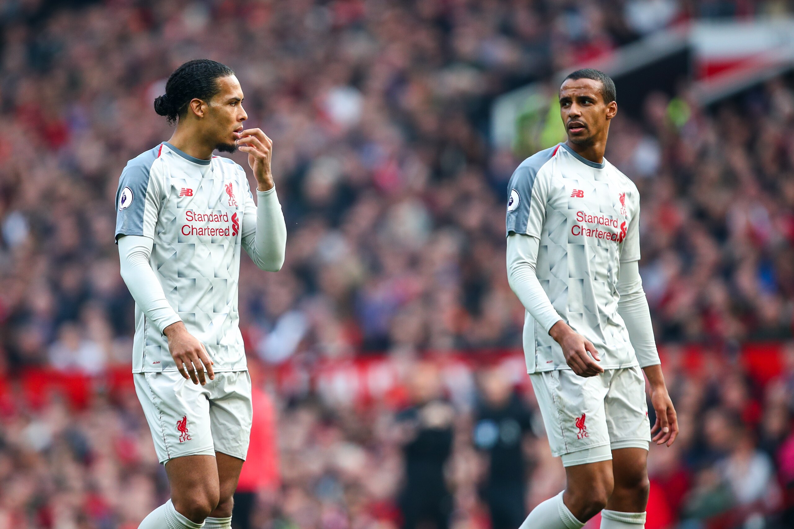 MANCHESTER, ENGLAND - FEBRUARY 24: Virgil van Dijk of Liverpool and Joel Matip of Liverpool during the Premier League match between Manchester United and Liverpool FC at Old Trafford on February 24, 2019 in Manchester, United Kingdom. (Photo by Robbie Jay Barratt - AMA/Getty Images)