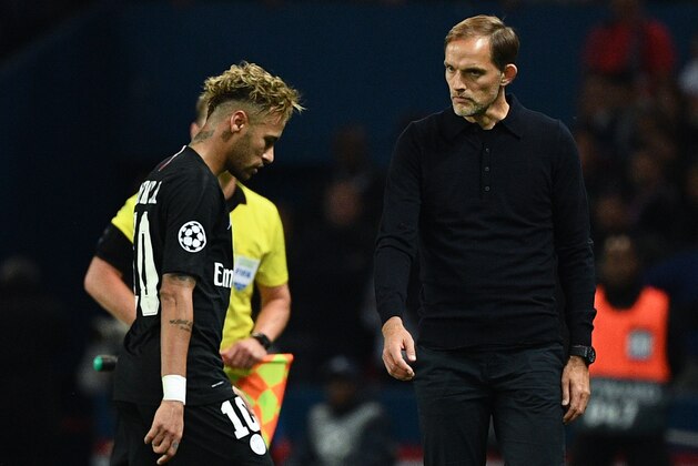 Paris Saint-Germain's Brazilian forward Neymar (L) and Paris Saint-Germain's German coach Thomas Tuchel react at the end of the UEFA Champions League Group C football match between Paris Saint-Germain and SSC Napoli at the Parc des Princes stadium, in Paris, on October 24, 2018. (Photo by FRANCK FIFE / AFP)        (Photo credit should read FRANCK FIFE/AFP/Getty Images)