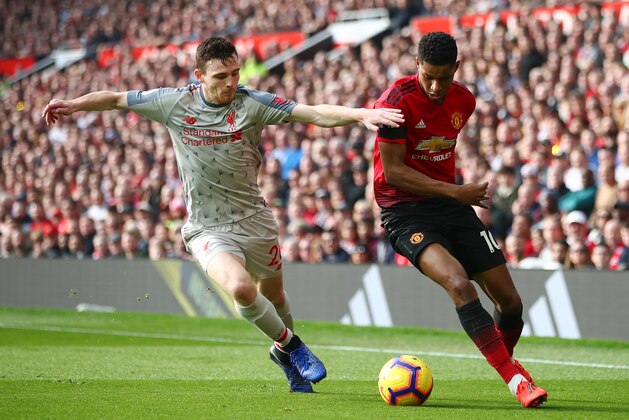 MANCHESTER, ENGLAND - FEBRUARY 24:  Marcus Rashford of Manchester United battles for possession with Andy Robertson of Liverpool during the Premier League match between Manchester United and Liverpool FC at Old Trafford on February 24, 2019 in Manchester, United Kingdom.  (Photo by Clive Brunskill/Getty Images)