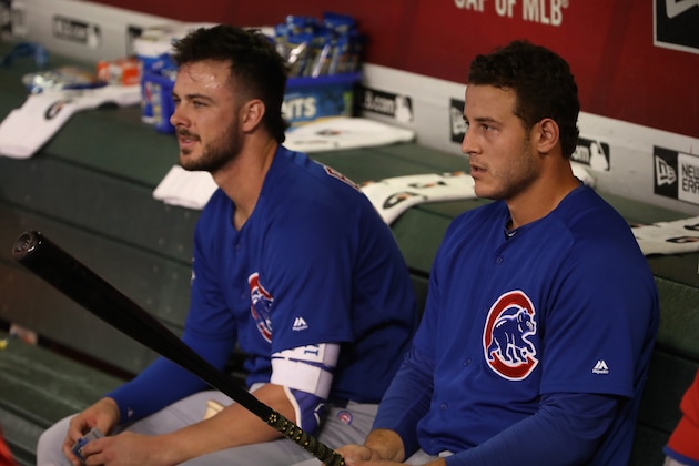 PHOENIX, AZ - SEPTEMBER 18:  Kris Bryant #17 and Anthony Rizzo #44 of the Chicago Cubs talk in the dugout before the MLB game against the Arizona Diamondbacks at Chase Field on September 18, 2018 in Phoenix, Arizona.  (Photo by Christian Petersen/Getty Images)