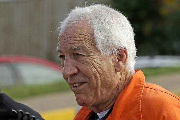 FILE - In this Aug. 12, 2016 file photo, former Penn State University assistant football coach Jerry Sandusky arrives at the Centre County Courthouse for an appeals hearing about whether he was improperly convicted four years ago, in Bellefonte, Pa.  Penn State’s costs related to the Sandusky scandal are approaching a quarter-billion dollars and growing. It’s been five years since the former assistant football coach was arrested on child molestation charges. The school’s overall cost of the scandal is now at least $237 million.  (AP Photo/Gene J. Puskar, File)