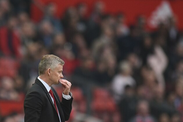 Manchester United's  Norwegian caretaker manager Ole Gunnar Solskjaer gestures from the touchline during the English Premier League football match between Manchester United and Liverpool at Old Trafford in Manchester, north west England, on February 24, 2019. (Photo by Oli SCARFF / AFP) / RESTRICTED TO EDITORIAL USE. No use with unauthorized audio, video, data, fixture lists, club/league logos or 'live' services. Online in-match use limited to 120 images. An additional 40 images may be used in extra time. No video emulation. Social media in-match use limited to 120 images. An additional 40 images may be used in extra time. No use in betting publications, games or single club/league/player publications. /         (Photo credit should read OLI SCARFF/AFP/Getty Images)