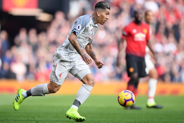 MANCHESTER, ENGLAND - FEBRUARY 24: Roberto Firmino of Liverpool runs with the ball during the Premier League match between Manchester United and Liverpool FC at Old Trafford on February 24, 2019 in Manchester, United Kingdom. (Photo by Laurence Griffiths/Getty Images)