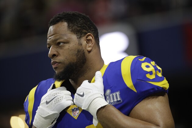 Los Angeles Rams' Ndamukong Suh (93) warms up before the NFL Super Bowl 53 football game between the Los Angeles Rams and the New England Patriots Sunday, Feb. 3, 2019, in Atlanta. (AP Photo/Patrick Semansky)