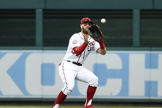 Washington Nationals right fielder Bryce Harper catches a line drive by New York Mets' Austin Jackson for the out during the fourth inning of a baseball game, Saturday, Sept. 22, 2018, in Washington. (AP Photo/Nick Wass)