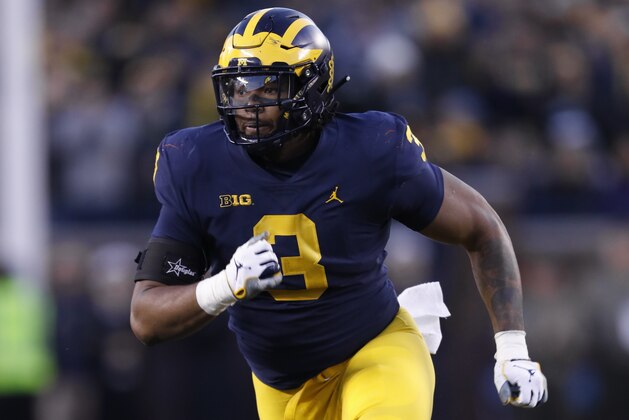 Michigan defensive lineman Rashan Gary plays against Penn State in the second half of an NCAA college football game in Ann Arbor, Mich., Saturday, Nov. 3, 2018. (AP Photo/Paul Sancya)