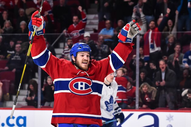 MONTREAL, QC - FEBRUARY 09:  Andrew Shaw #65 of the Montreal Canadiens reacts on a second period goal by teammate Tomas Tatar #90 (not pictured) against the Toronto Maple Leafs during the NHL game at the Bell Centre on February 9, 2019 in Montreal, Quebec, Canada.  The Toronto Maple Leafs defeated the Montreal Canadiens 4-3 in overtime.  (Photo by Minas Panagiotakis/Getty Images)