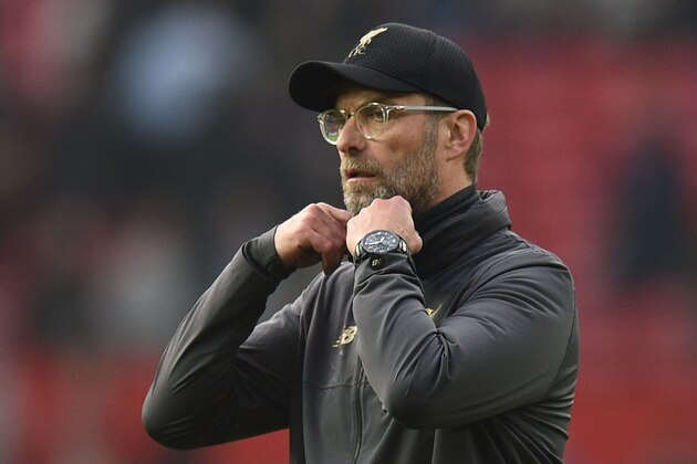 Liverpool's German manager Jurgen Klopp reacts after the final whistle of the English Premier League football match between Manchester United and Liverpool at Old Trafford in Manchester, north west England, on February 24, 2019. (Photo by Oli SCARFF / AFP) / RESTRICTED TO EDITORIAL USE. No use with unauthorized audio, video, data, fixture lists, club/league logos or 'live' services. Online in-match use limited to 120 images. An additional 40 images may be used in extra time. No video emulation. Social media in-match use limited to 120 images. An additional 40 images may be used in extra time. No use in betting publications, games or single club/league/player publications. /         (Photo credit should read OLI SCARFF/AFP/Getty Images)