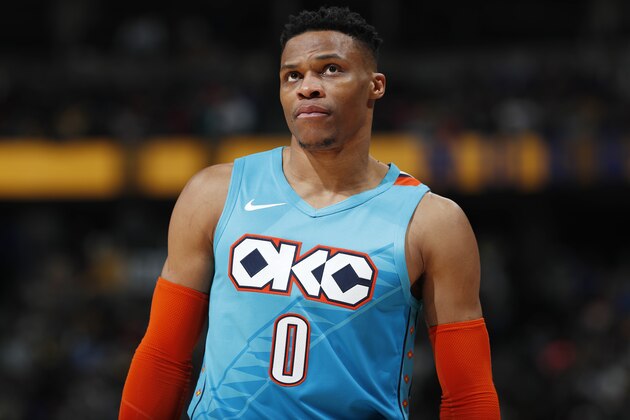 Oklahoma City Thunder guard Russell Westbrook looks at the scoreboard as time runs out in the second half of an NBA basketball game against the Denver Nuggets Tuesday, Feb. 26, 2019, in Denver. The Nuggets won 121-112. (AP Photo/David Zalubowski)