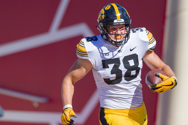 Iowa tight end T.J. Hockenson (38) rushes the ball into the end zone to score during the second half of an NCAA college football game against Indiana Saturday, Oct. 13, 2018, in Bloomington, Ind. Iowa won 42-16. (AP Photo/Doug McSchooler)