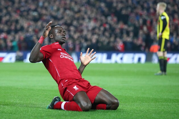 LIVERPOOL, ENGLAND - FEBRUARY 27: Sadio Mane of Liverpool celebrates after scoring his team's first goal during the Premier League match between Liverpool FC and Watford FC at Anfield on February 27, 2019 in Liverpool, United Kingdom. (Photo by Clive Brunskill/Getty Images)