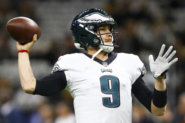 Philadelphia Eagles quarterback Nick Foles (9) warms up before before an NFL divisional playoff football game against the New Orleans Saints, in New Orleans, Sunday, Jan. 13, 2019. (AP Photo/Butch Dill)